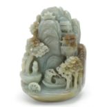 Chinese green and russet jade landscape carving of a fisherman before mountains, 11cm high