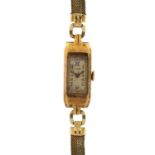 18ct gold ladies Buren wristwatch with gilt metal strap, the case 11mm wide, 13.0g