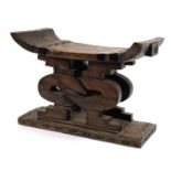Large tribal interest carved hardwood headrest design stool, 39.5cm H x 56cm W x 20.5cm D