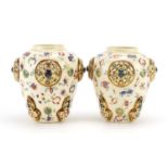 Zsolnay Pecs, pair of Hungarian vases with pierced roundels decorated with flowers, each with