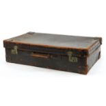 Large vintage brown leather suitcase, Invincible Product label to the interior, 78cm wide