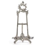 Rococo style silvered metal easel stand, 41cm high