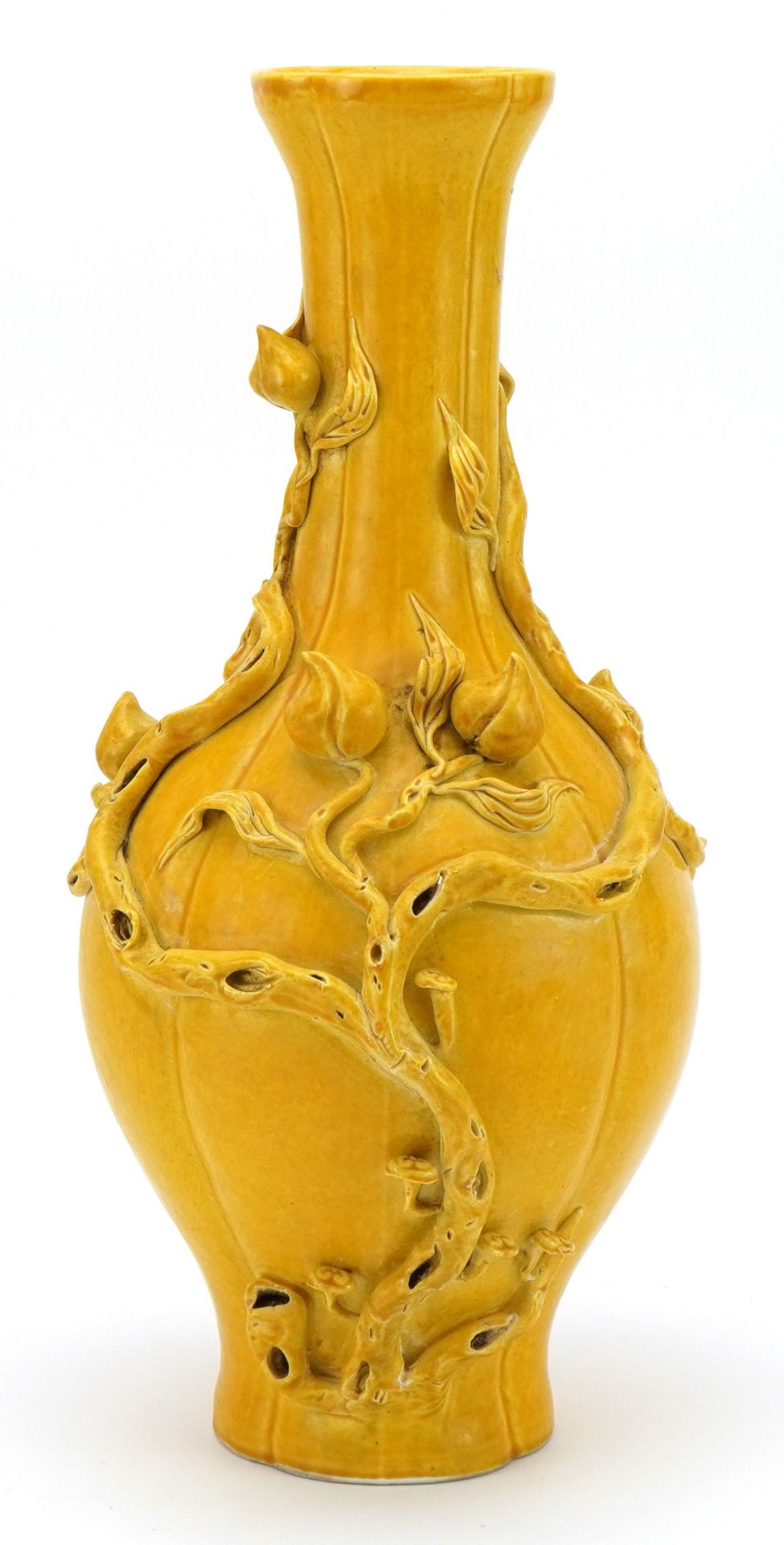 Chinese porcelain vase having a yellow glaze, decorated in relief with peaches, six figure character