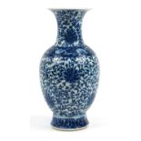 Chinese blue and white porcelain vase hand painted with bats and flower heads amongst scrolling