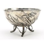 Kuhn & Komor, Japanese sterling silver bowl raised on three naturalistic feet and embossed with