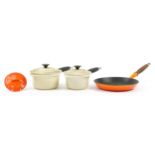 Vintage and later enamel kitchen saucepans and frying pans including Le Creuset, the largest 52.