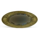 Attributed to Margaret Gilmore, Arts & Crafts Newlyn school wall mirror with bevelled plate embossed