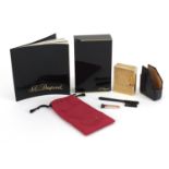 S J Dupont gold plated pocket lighter with crocodile effect protective case, box and booklet, the