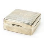 Mappin & Webb, Art Deco silver cigarette box, the hinged lid with engine turned decoration,