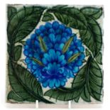 William De Morgan for Merton Abbey, Arts & Crafts pottery tile hand painted with a stylised flower