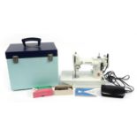 1960s Singer Featherweight 221K pale turquoise enamel sewing machine with case