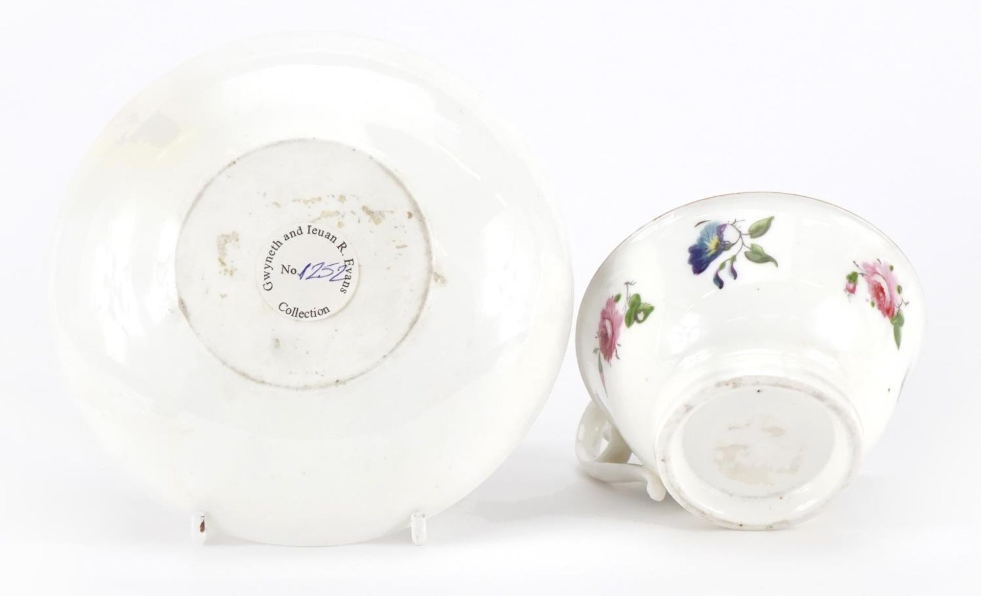 Early 19th century Nantgarw cup and saucer hand painted with flowers, the cup 5cm high - Image 3 of 4