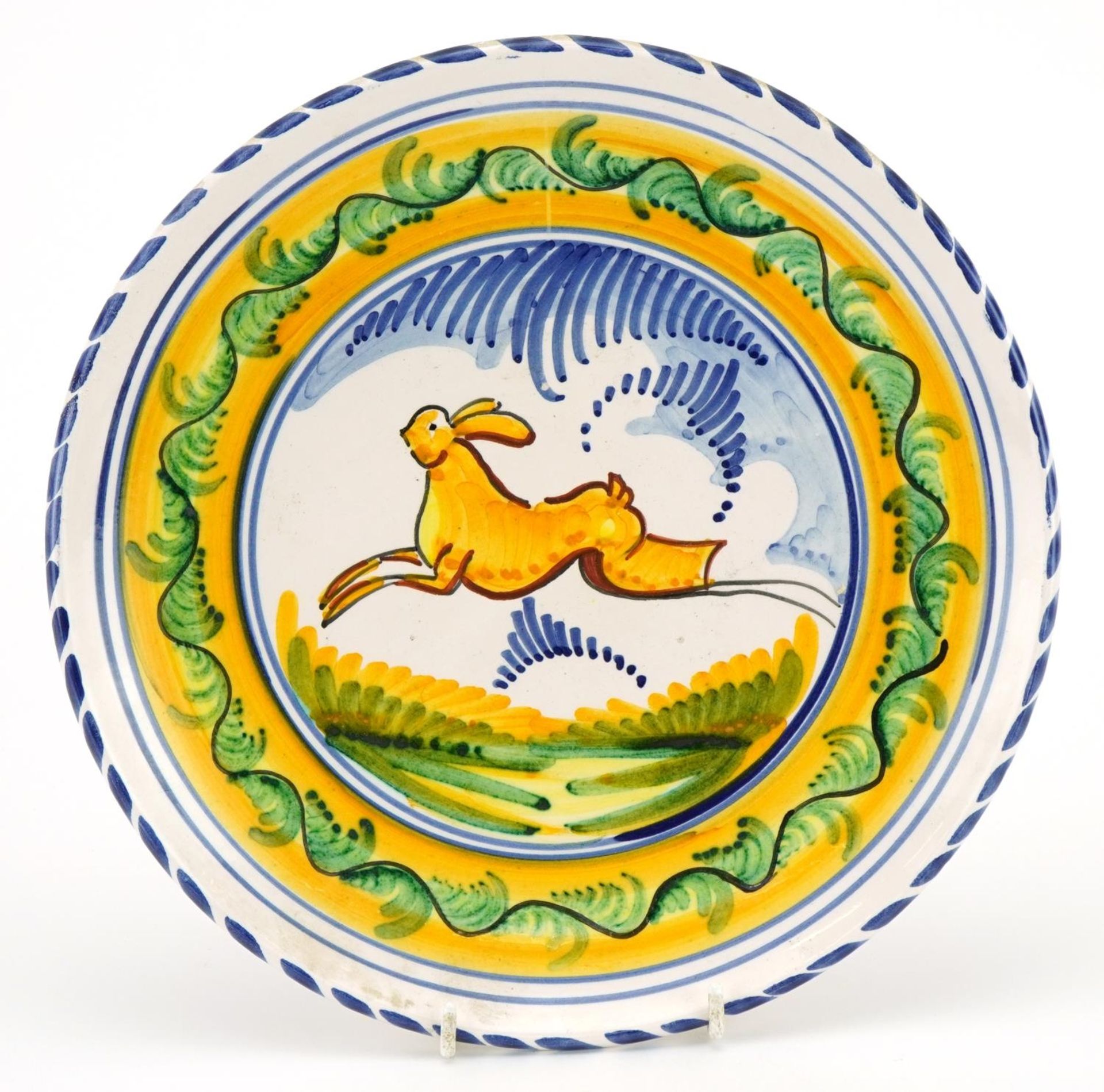 Continental Italian Maiolica wall plate hand painted with a leaping hare, 26cm in diameter