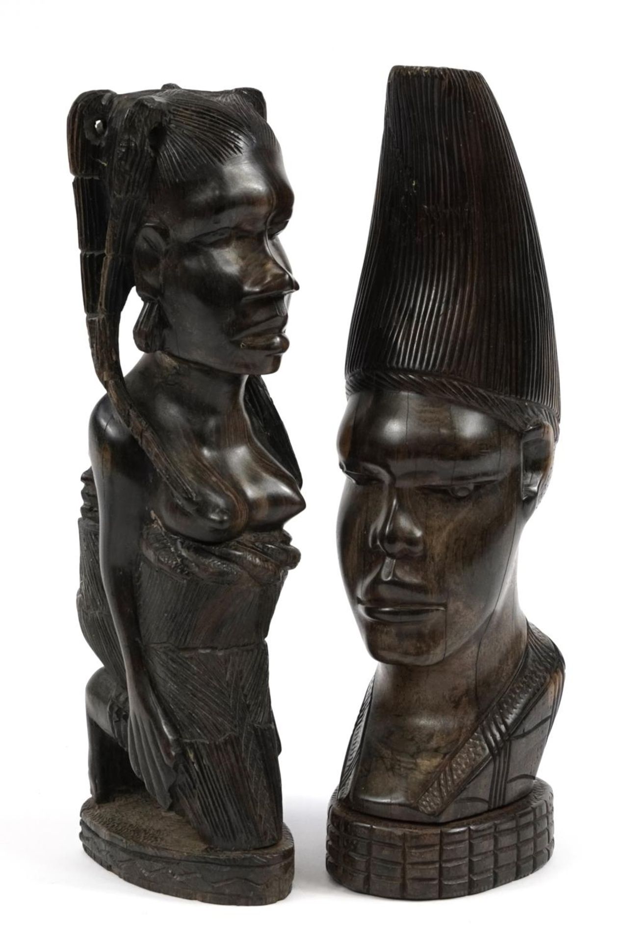 Two African tribal interest ebony carvings including one of a semi nude tribeswoman with baby,