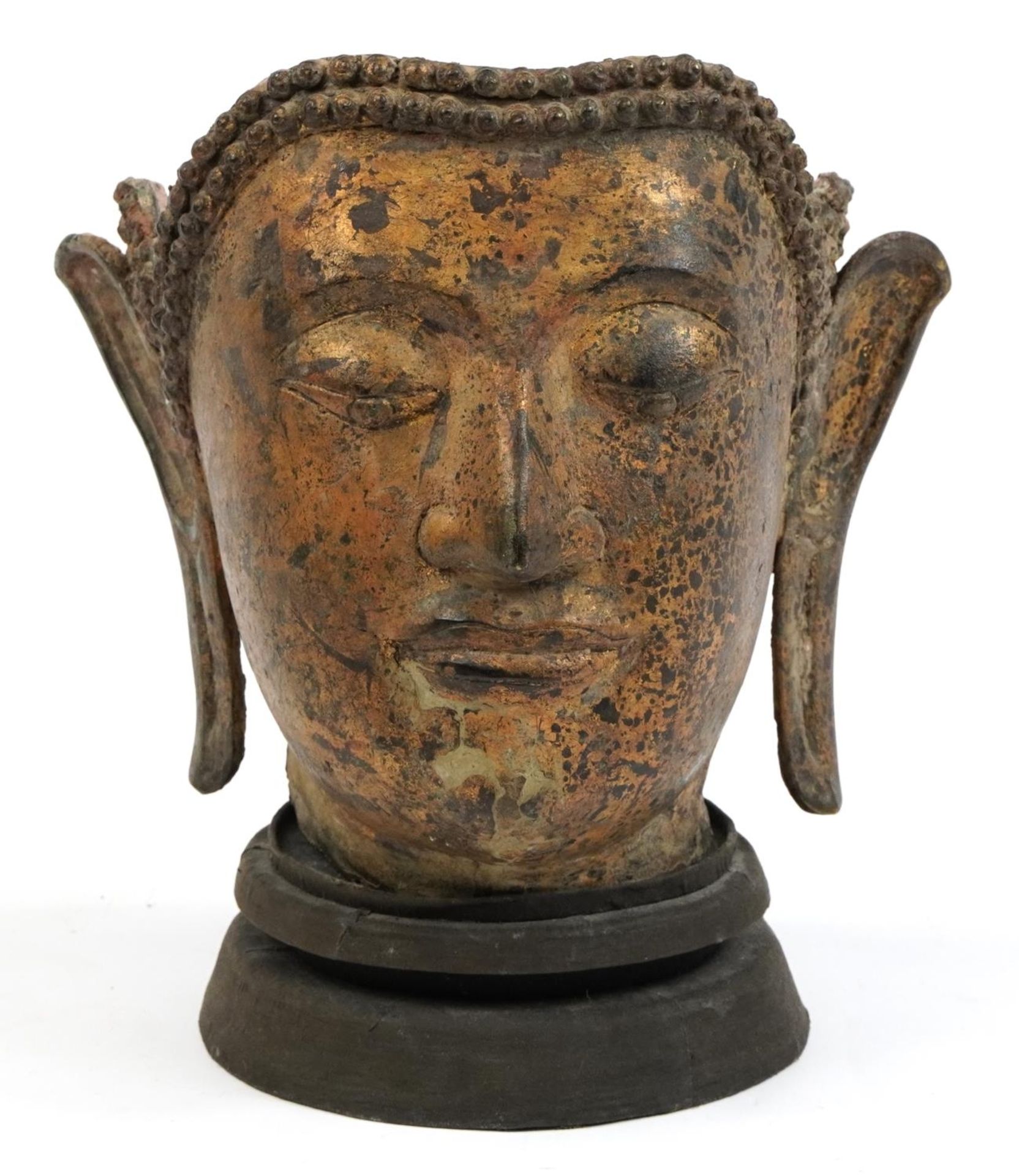 Chino Tibetan gilt bronze Buddha head raised on stand, 31cm high