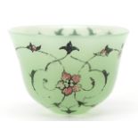 Islamic Ottoman green glass coffee cup hand painted with foliage, 6cm in diameter
