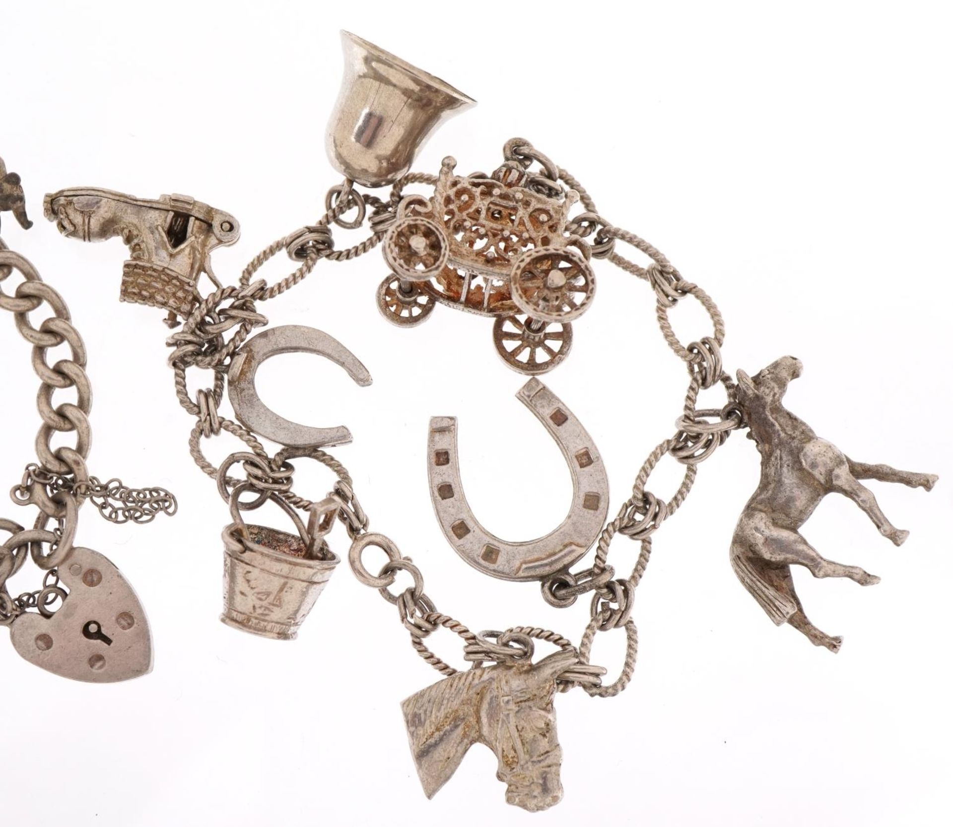 Two silver charm bracelets with a selection of mostly silver charms including horsehead, carriage - Image 3 of 4