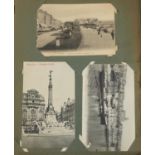 Collection of postcards arranged in two albums, some real photographic including topographical