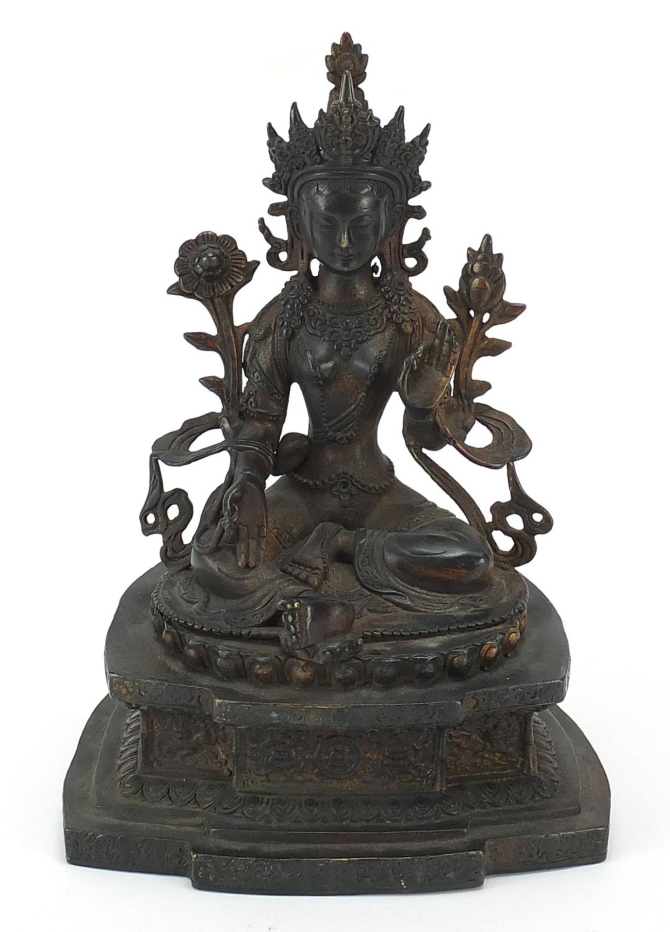Chino Tibetan patinated bronze figure of Buddha, character marks to the reverse, 27cm high