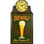 Breweriana interest wooden wall clock inscribed Brewing Co Beers Bock, 80cm high