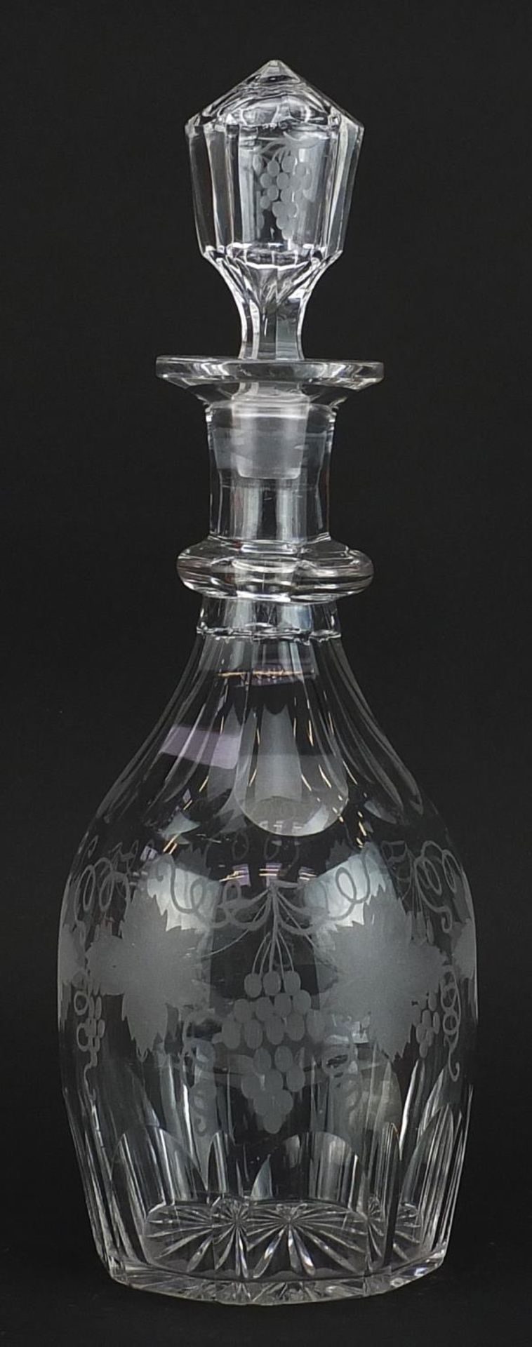 Victorian cut glass decanter etched with leaves and berries, 34cm high