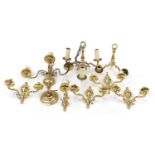 Seven brass wall sconces including a set of four and a three branch chandelier, the largest 30cm