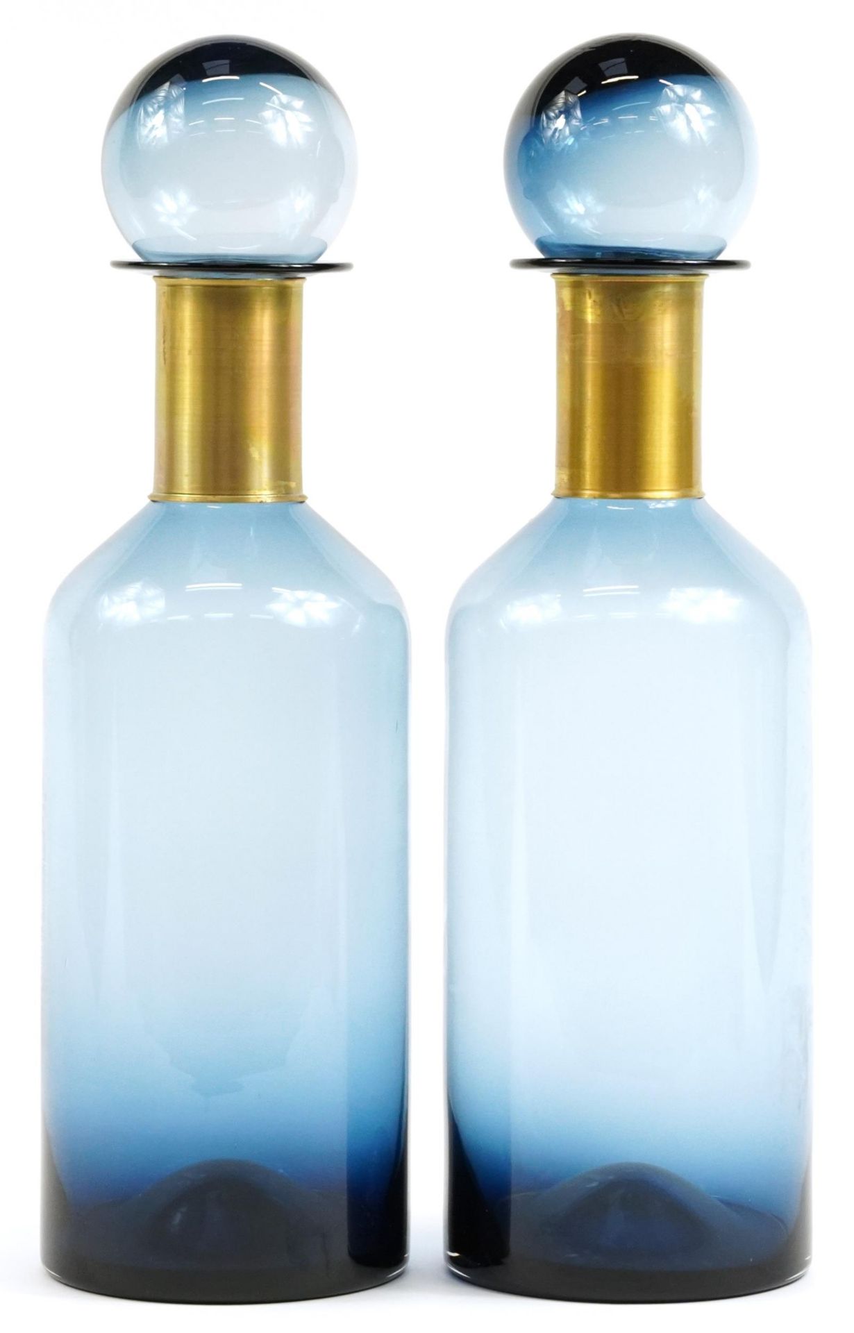 Pair of oversized blue glass display scent bottles with stoppers in the style of Holmegaard, each