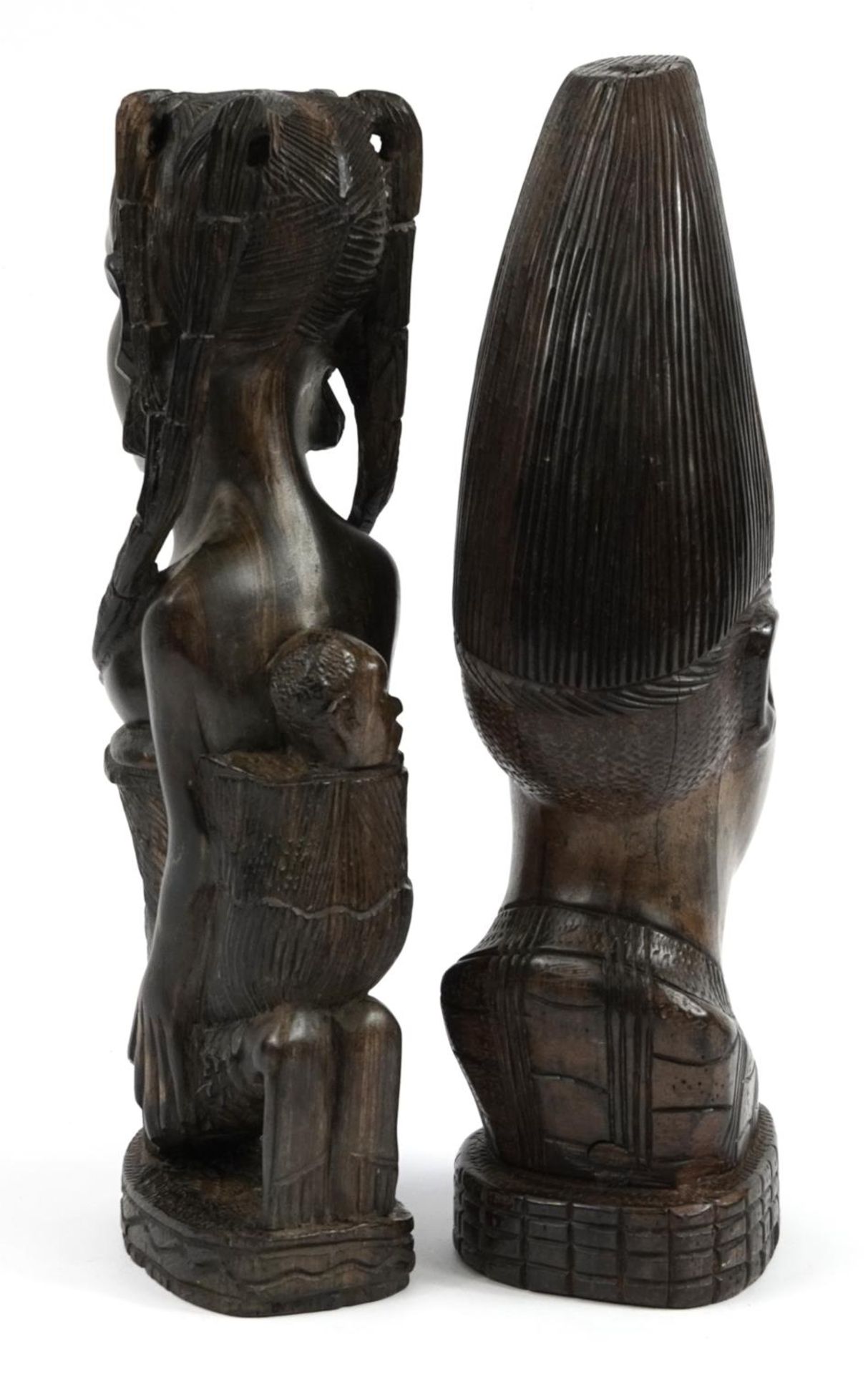 Two African tribal interest ebony carvings including one of a semi nude tribeswoman with baby, - Image 2 of 3