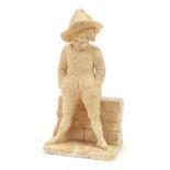 Alabaster sculpture of a standing young Dutch boy, 39cm high