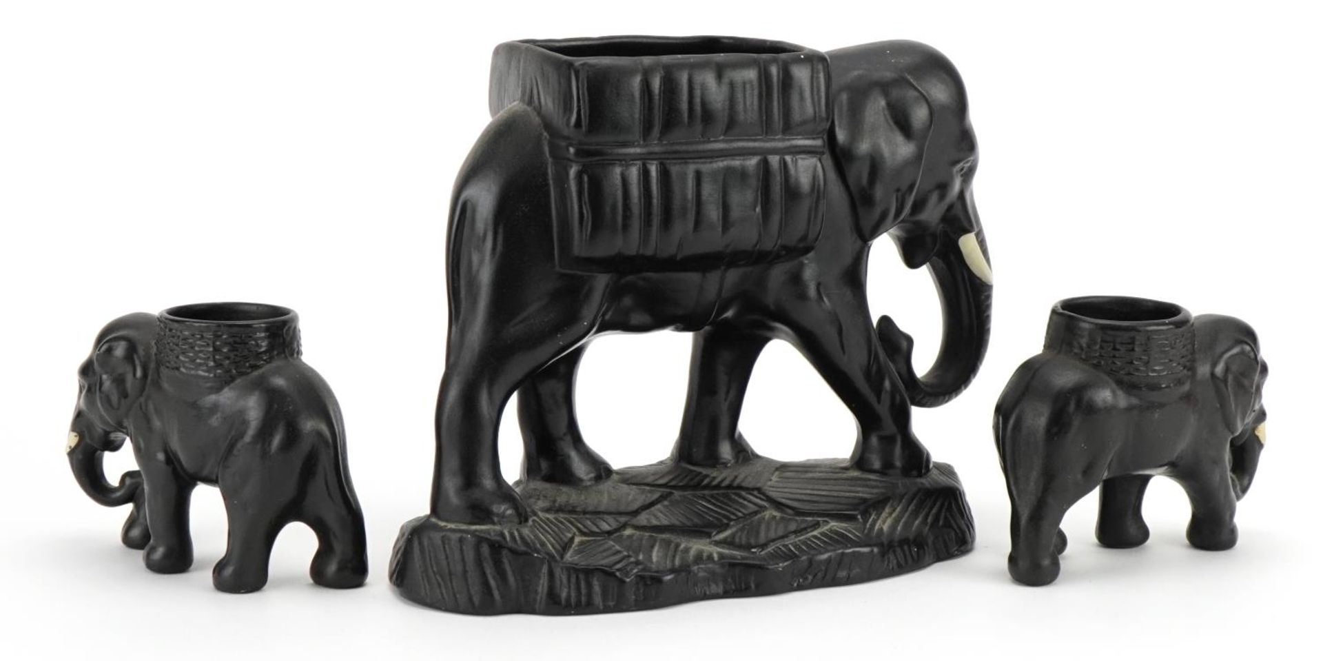 Three early 20th century black painted pottery lion design planters, the largest 21cm in length - Bild 2 aus 3