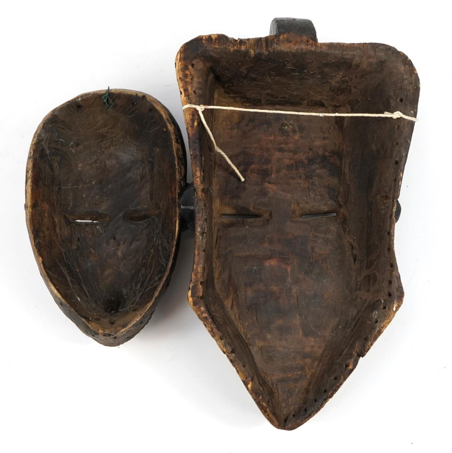 Two Tribal interest face masks including one with white paint, the largest 38cm high - Image 2 of 2