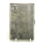 Art Deco rectangular silver cigarette case with engine turned decoration and gilt interior,