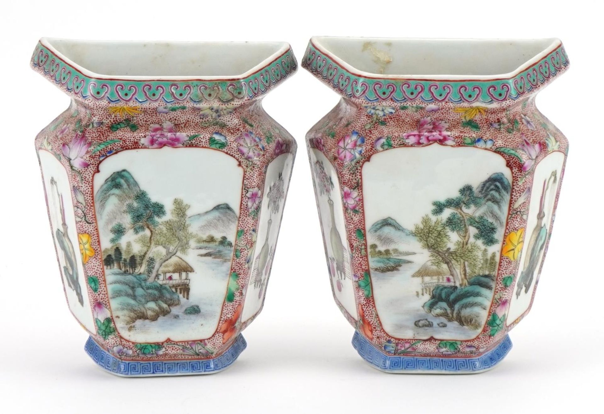 Pair of Chinese porcelain half vase wall pockets hand painted in the famille rose palette with