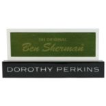 Two shop advertising display signs comprising The Original Ben Sherman and Dorothy Perkins, the