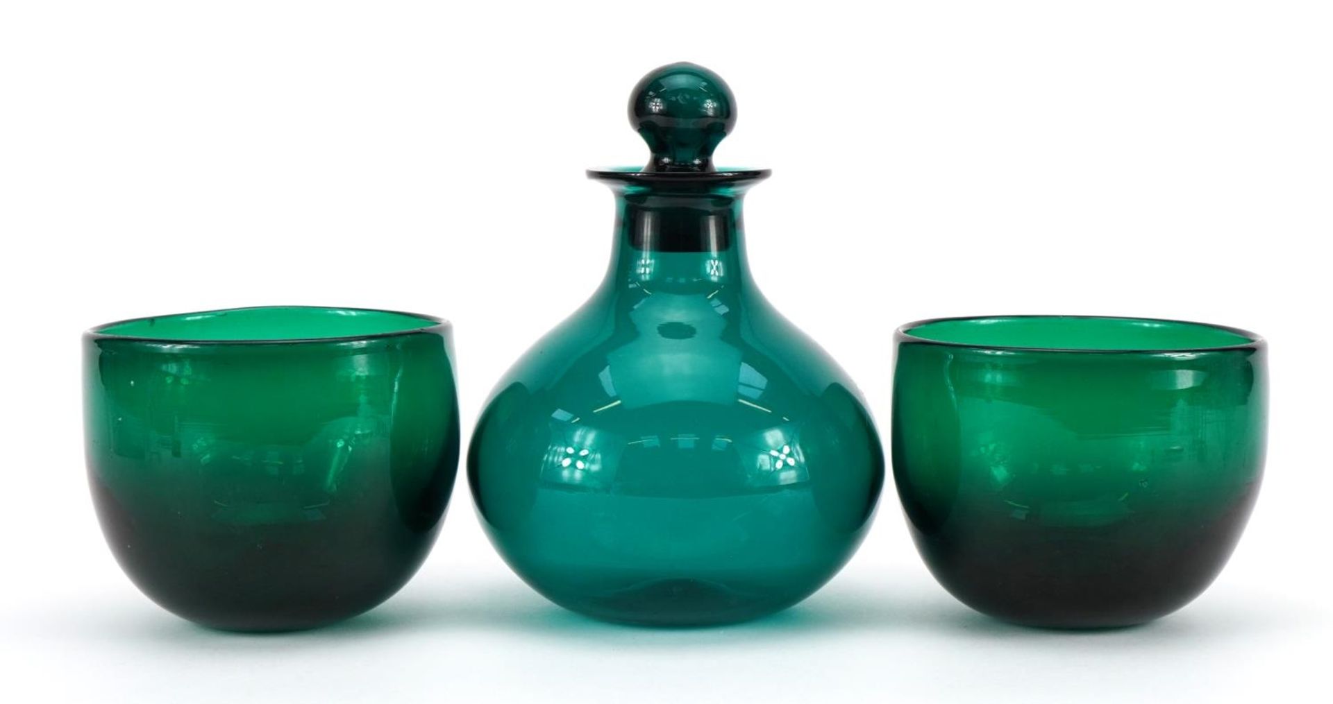 Green glass scent bottle with stopper and a pair of green glass bowls, the largest 17.5cm high