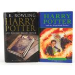 Two Harry Potter Half Blood Prince hardback books with misspellings on pages ninety nine, both first