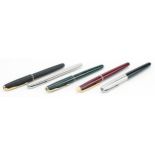 Five Parker and Watermans ballpoint and fountain pens