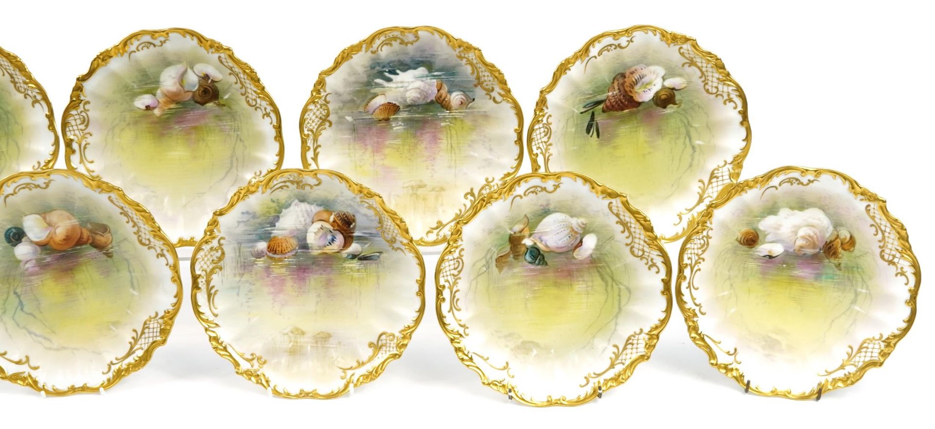 Limoges, Ten French porcelain desert plates with gilt borders, each hand painted with shells and - Image 3 of 5