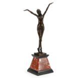 Large patinated bronze figurine of an Art Deco female raised on a tapered marble and black slate