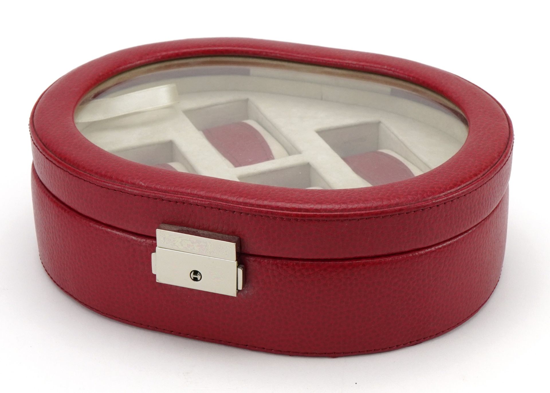 Red leather and suede wristwatch display case, 7.5cm H x 23.5cm W x 18.5cm D