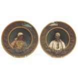 Goldscheider, pair of Austrian terracotta wall plates decorated in relief with Arab busts, various