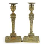 Pair of early 20th century silver plated Adams Revival candlesticks with rams heads and urns, each