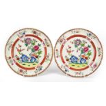 Pair of early 19th century Swansea porcelain plates decorated with flowers, each with Sir Leslie