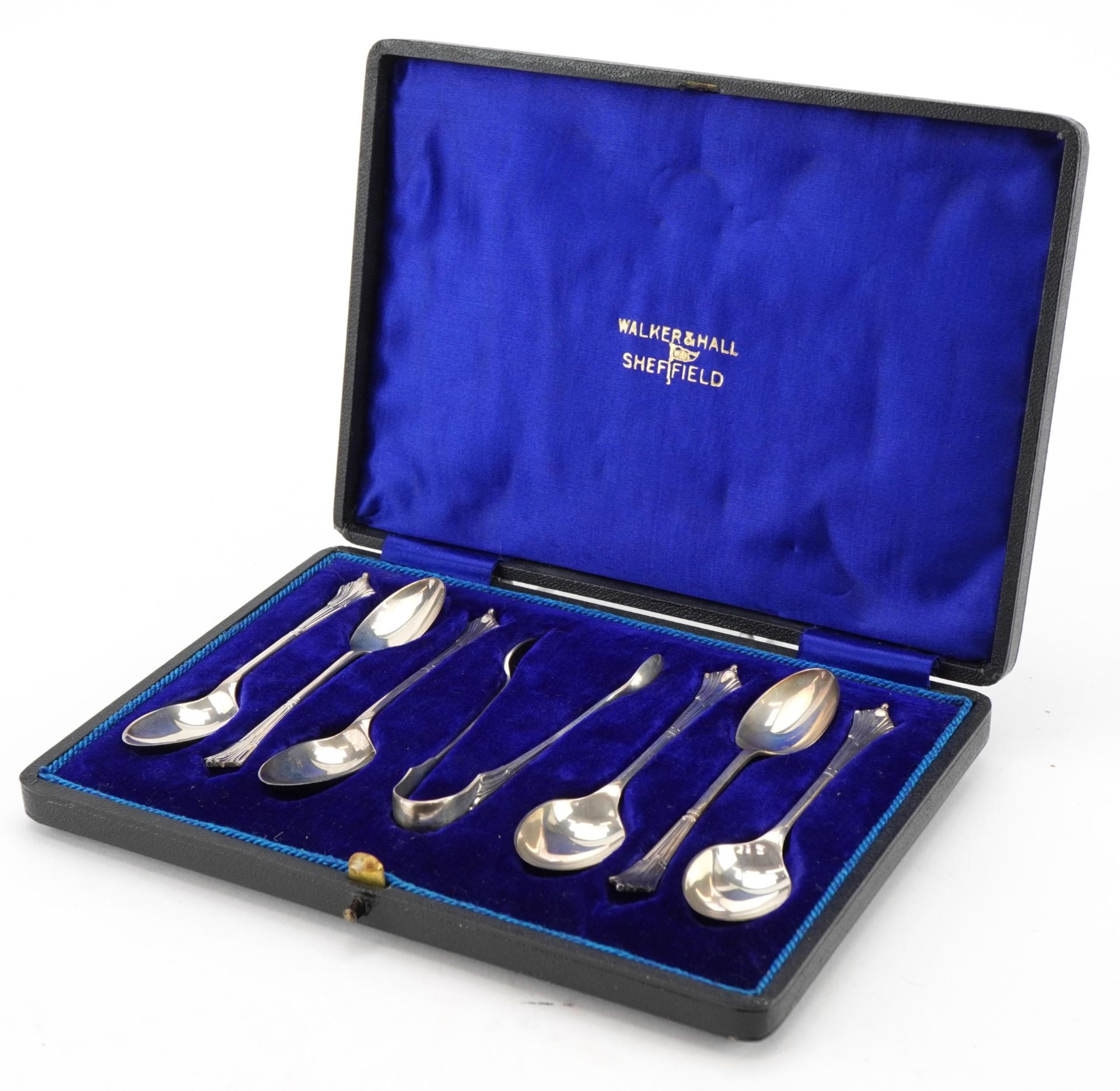 Walker & Hall, set of six George V silver teaspoons with matching sugar tongs housed in a velvet and