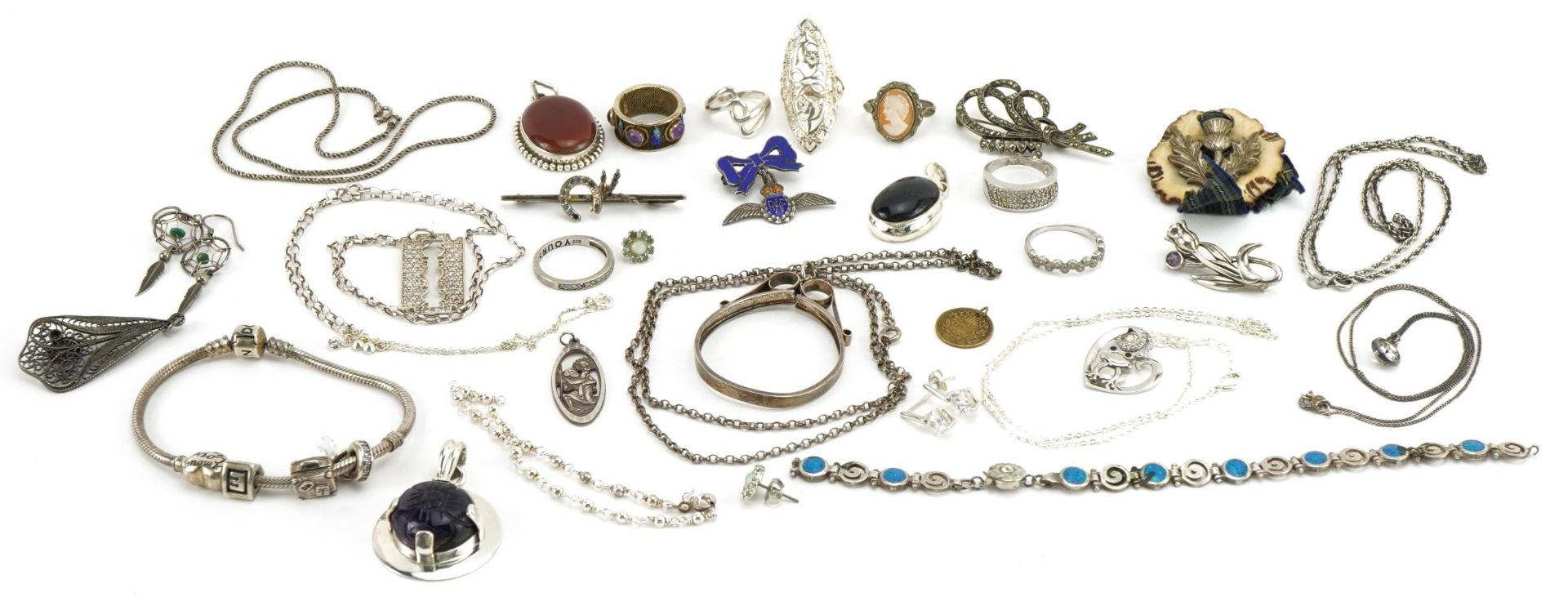 Silver and white metal jewellery including rings, Royal Air Force bow brooch and pendants, total