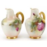 Pair of Royal Worcester blush ivory jugs hand painted with roses, each numbered 1094, each 13cm high