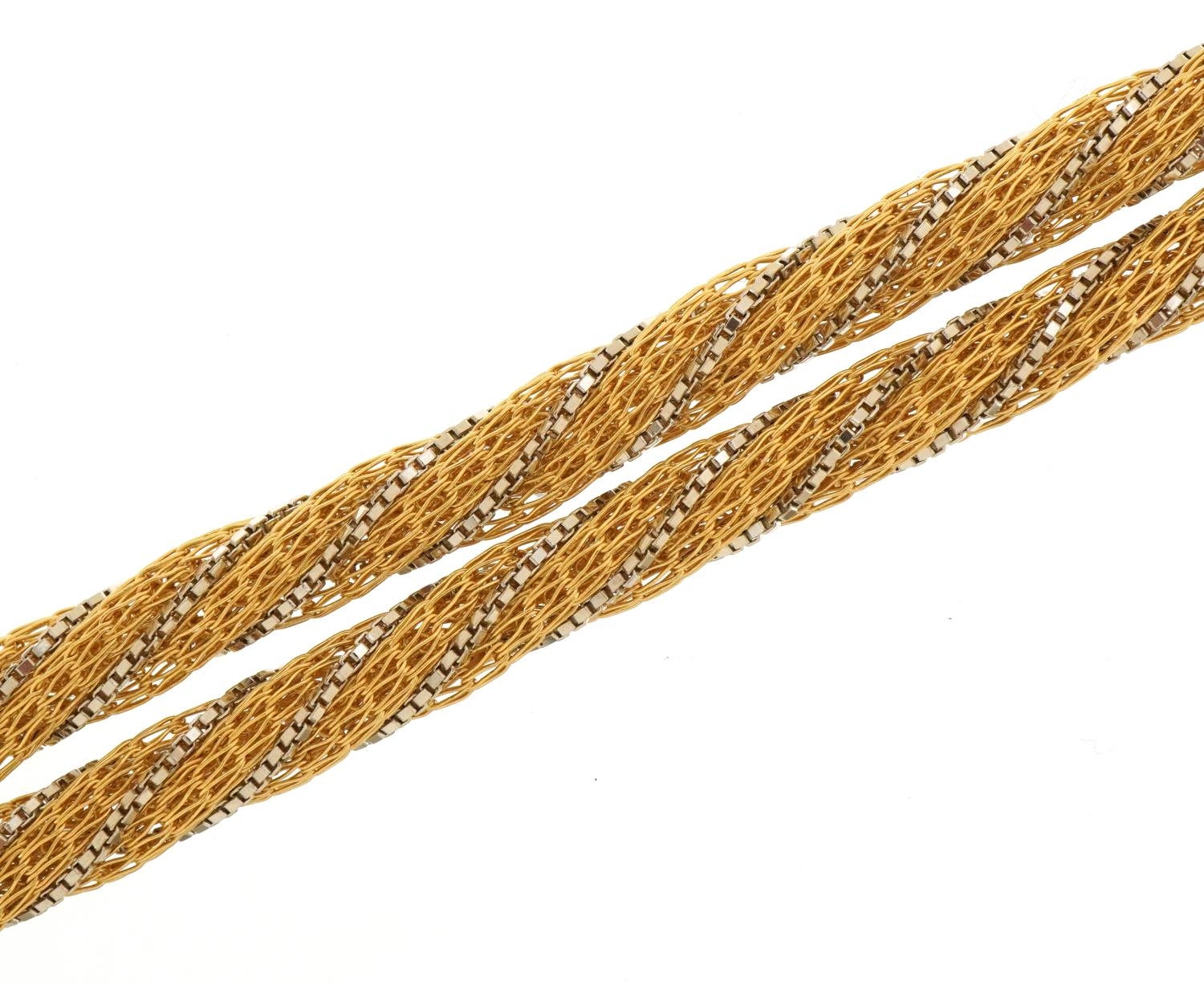 18ct two tone gold rope twist necklace with 1980s insurance valuation, 61cm in length, 41.9g
