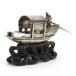 Luen Wo, Chinese silver model of a boat raised on a carved hardwood stand, 9.5cm in length, 43.3g
