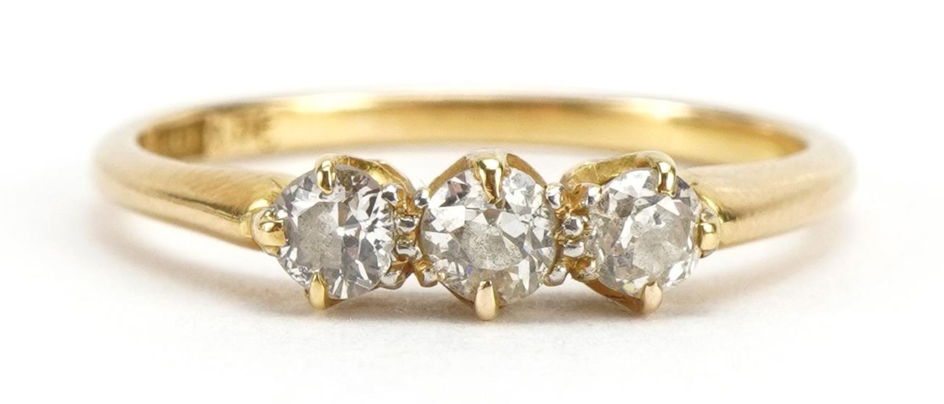 18ct gold diamond three stone ring, the largest diamond approximately 3.4cm in diameter, size O, 2.