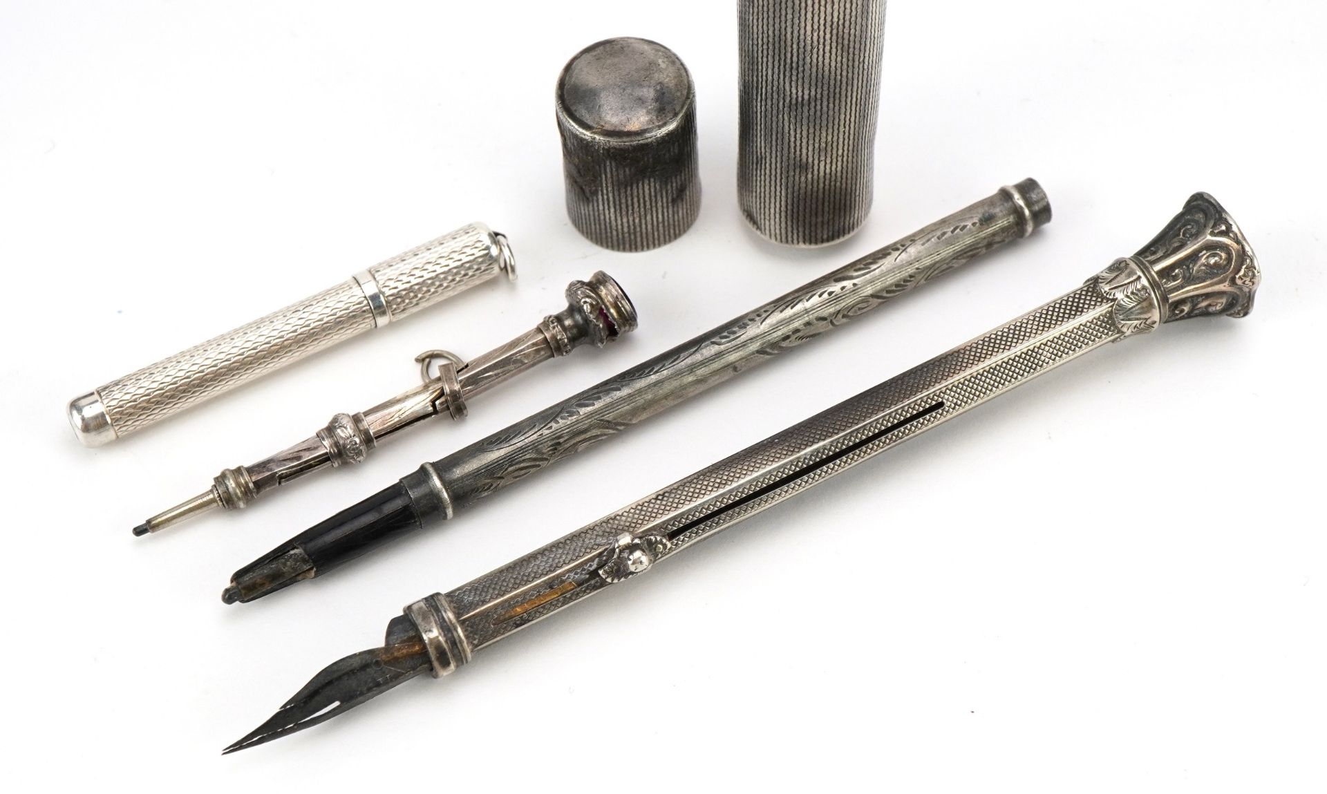 Four antique and later silver propelling pens and pencils and a sterling silver cased pocket lighter - Image 3 of 5